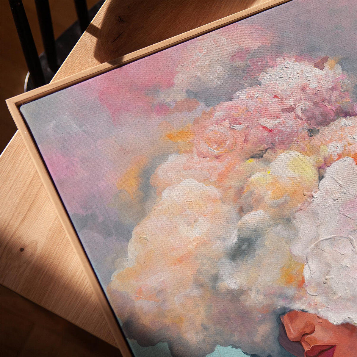 Closeup of Vapor Dreams, Limited Edition Canvas Art Print featuring soft pastel florals and abstract clouds in natural oak frame.